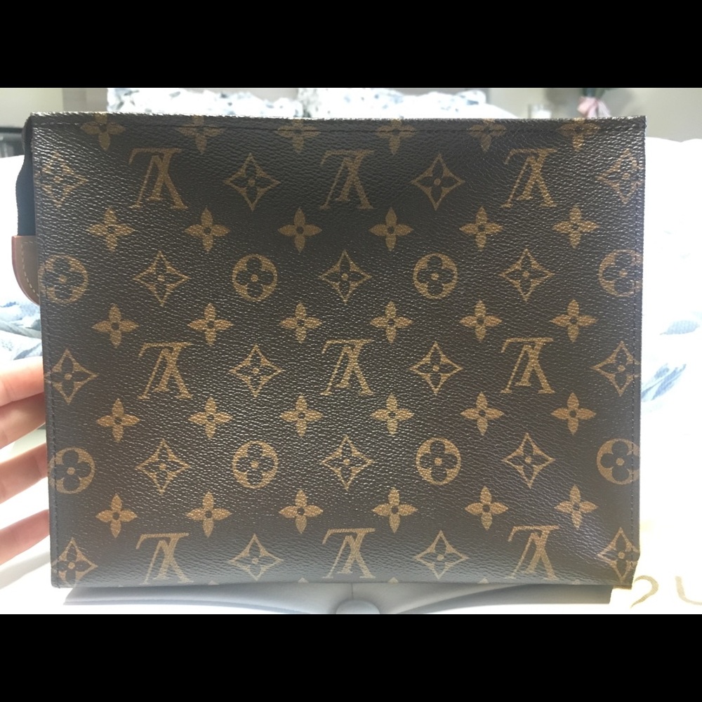 Sold! Louis Vuitton toiletry 26